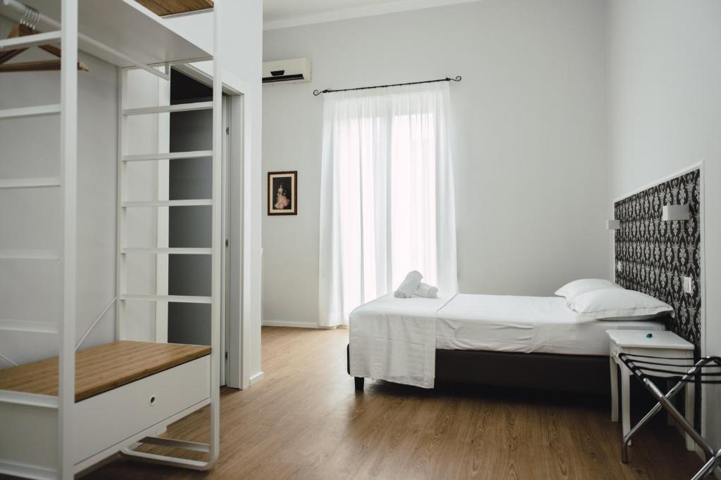 Posteľ alebo postele v izbe v ubytovaní Elysium B&B