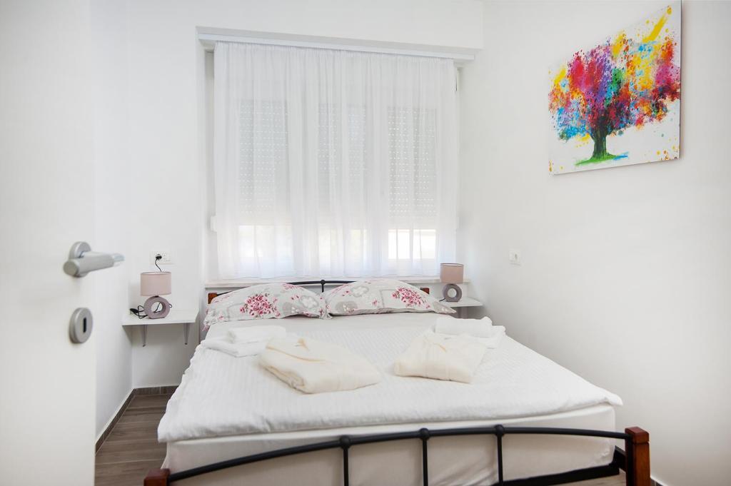 Posteľ alebo postele v izbe v ubytovaní Apartman ''Petar''