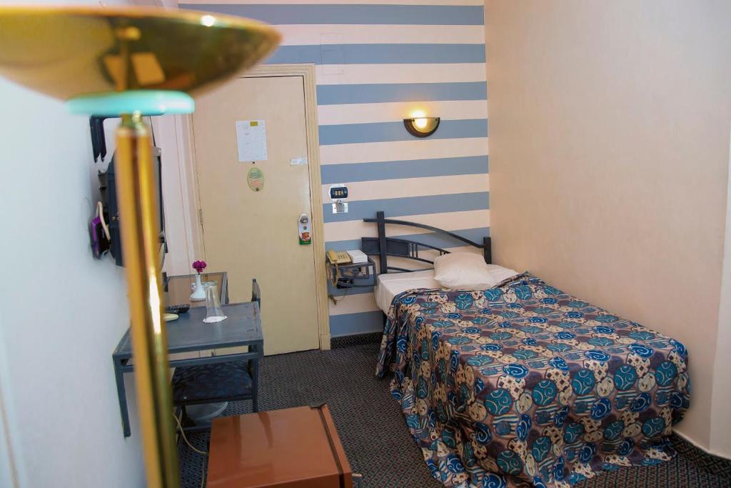 Postel nebo postele na pokoji v ubytování Havana Hotel Cairo
