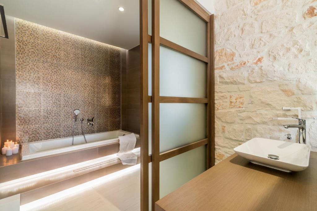 A bathroom at Porto Vasilikos Villas