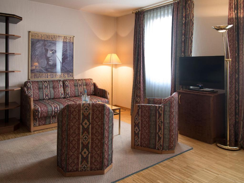 TV a/nebo společenská místnost v ubytování Posthaus Hotel Residenz