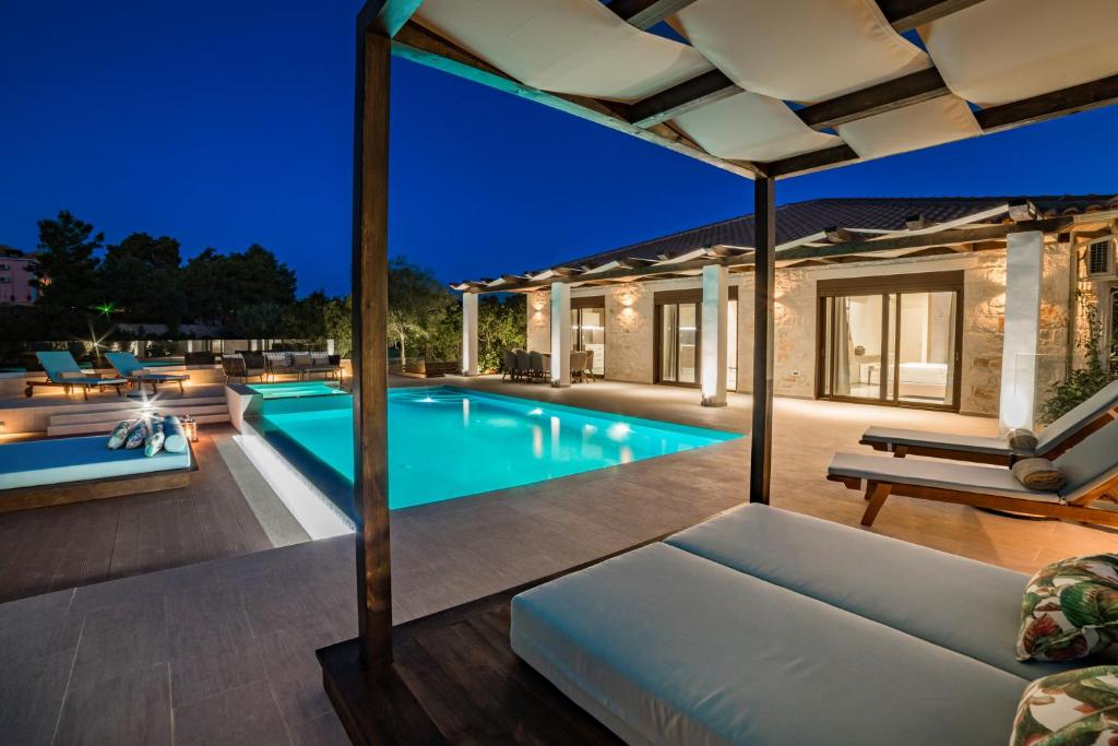 The swimming pool at or close to Porto Vasilikos Villas