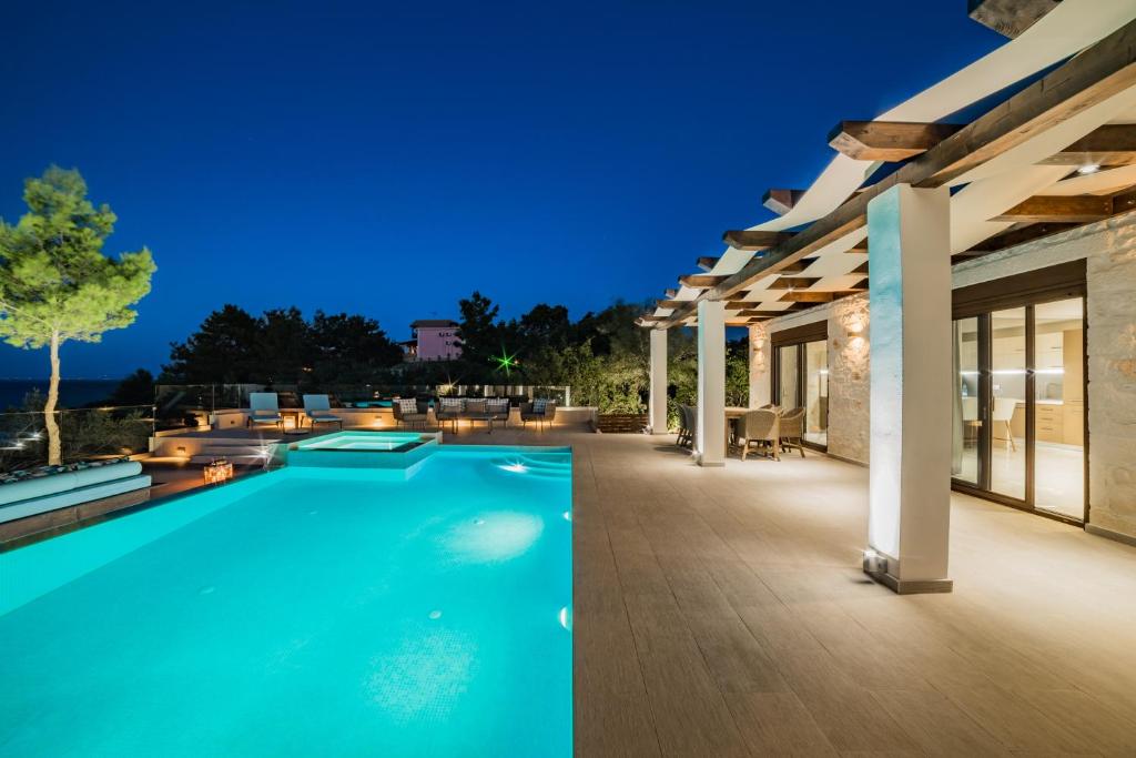 The swimming pool at or close to Porto Vasilikos Villas
