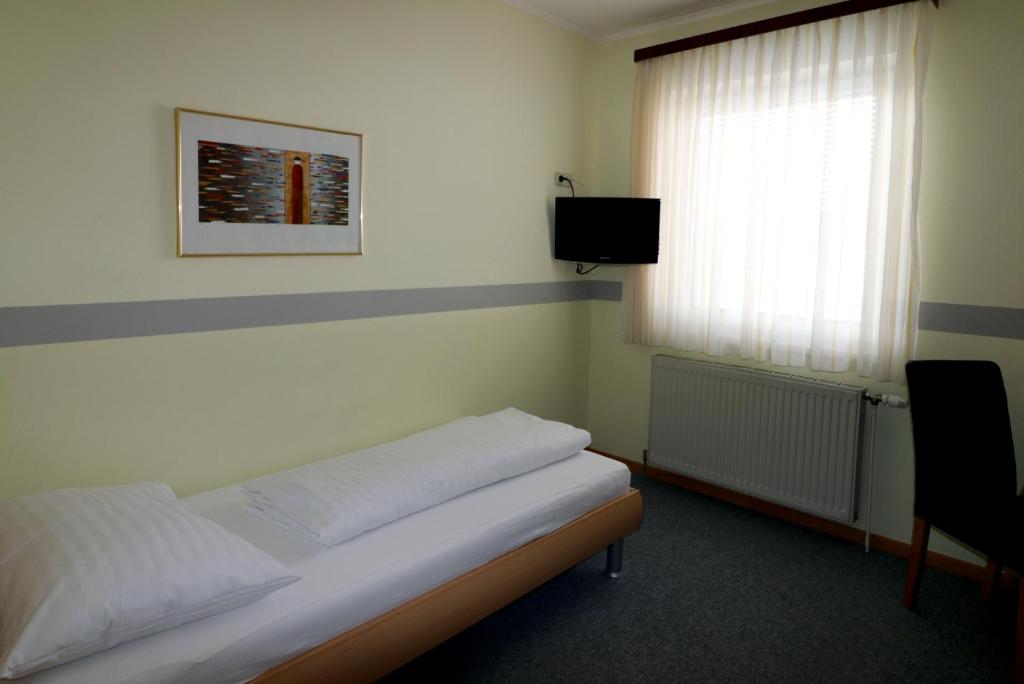 Postel nebo postele na pokoji v ubytování Schlafgut