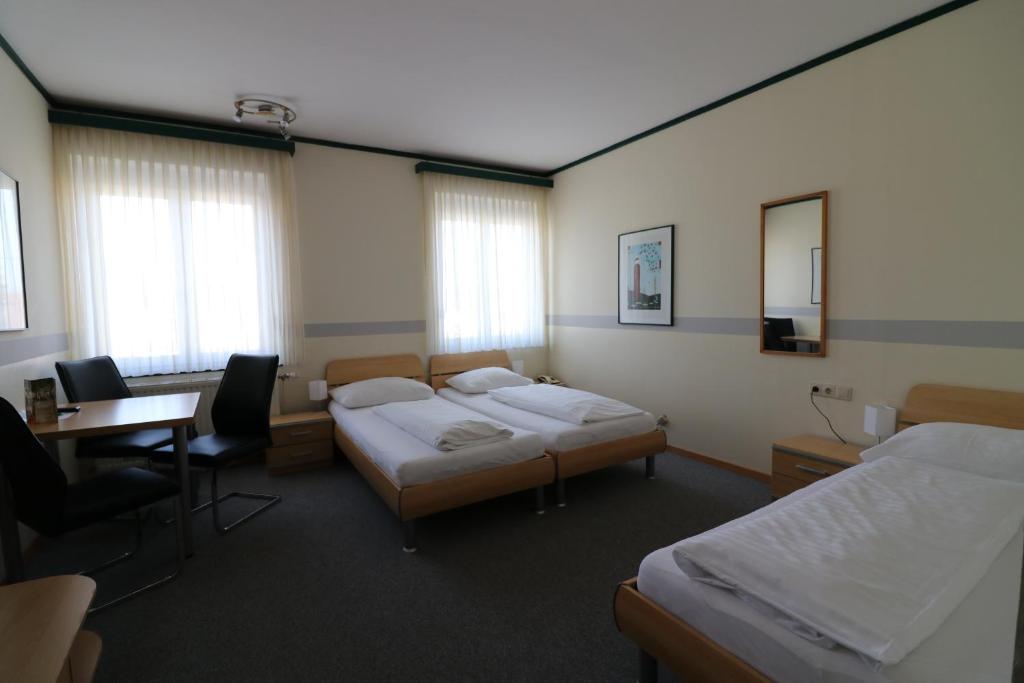 Postel nebo postele na pokoji v ubytování Schlafgut