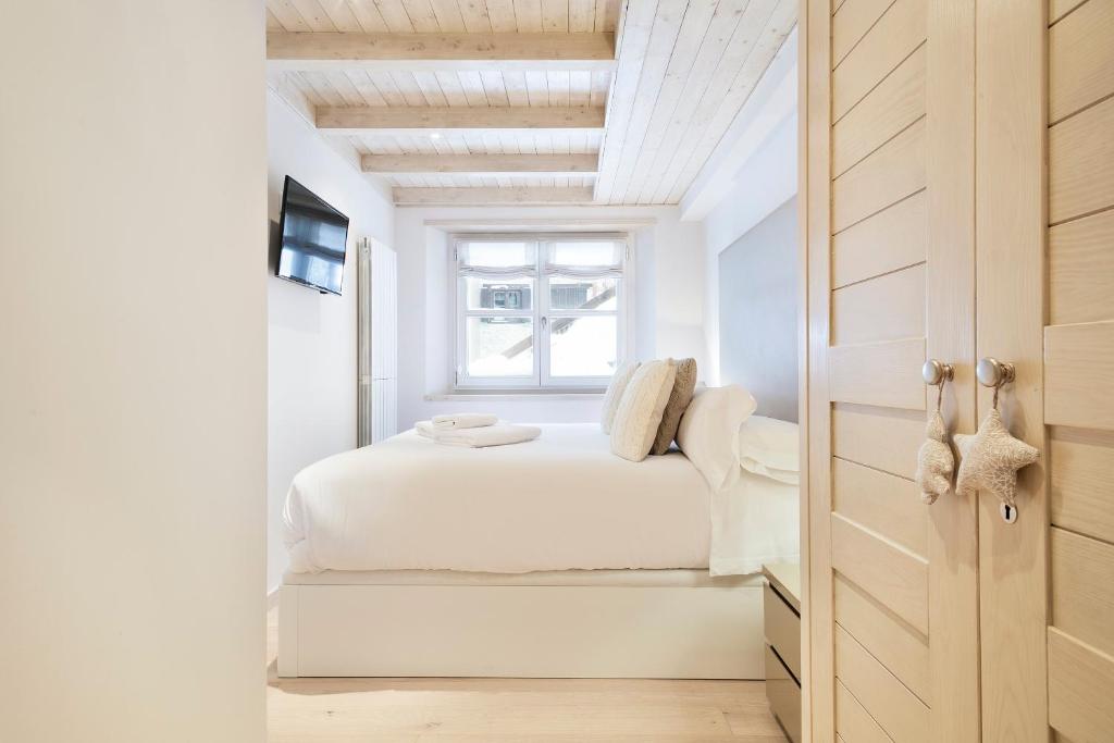 Posteľ alebo postele v izbe v ubytovaní Val de Ruda Luxe 60 by FeelFree Rentals