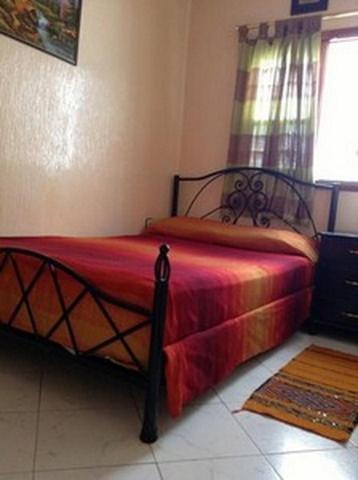 Postel nebo postele na pokoji v ubytování Hôtel Tijani
