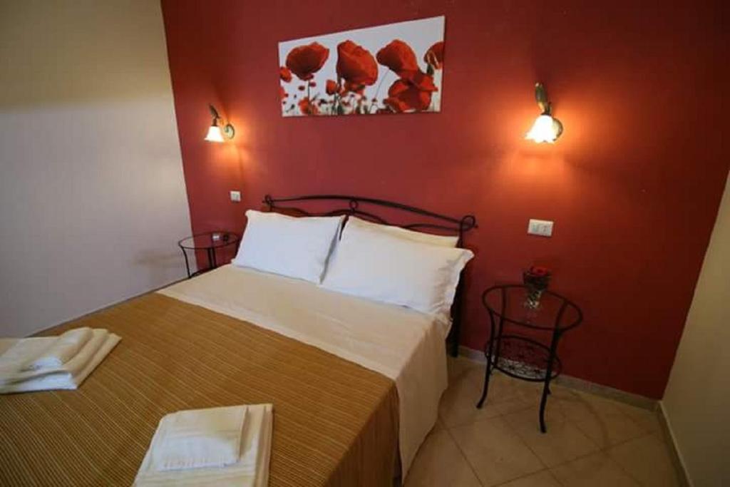 Postel nebo postele na pokoji v ubytování Casa Antica