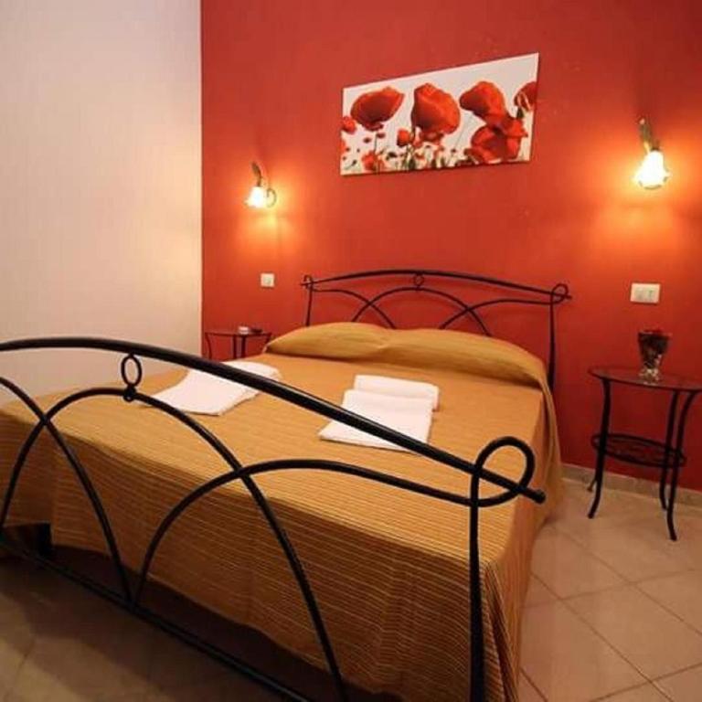 Postel nebo postele na pokoji v ubytování Casa Antica