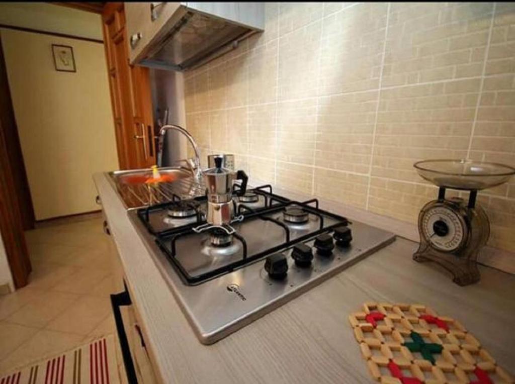 Kuchyň nebo kuchyňský kout v ubytování Casa Antica