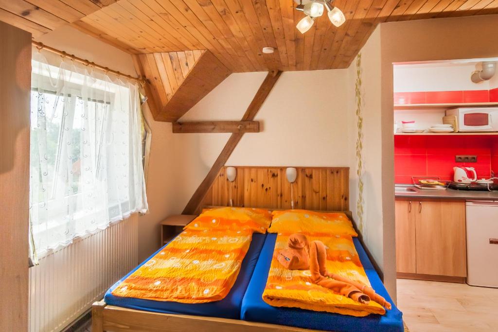 Postel nebo postele na pokoji v ubytování Penzion Agáta