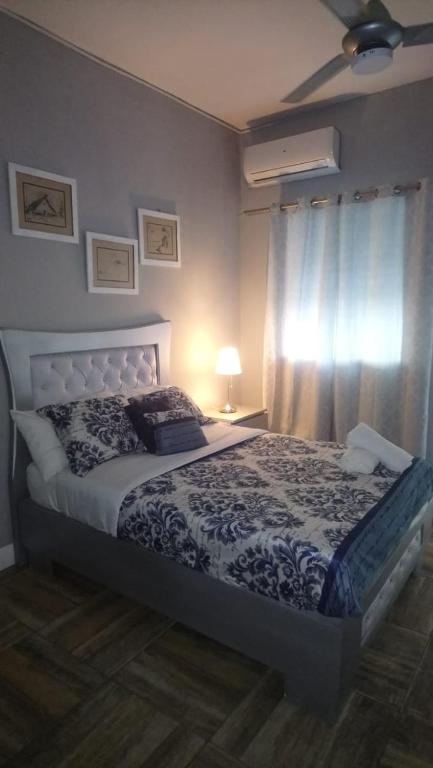 Postel nebo postele na pokoji v ubytování Tavalero Rooms