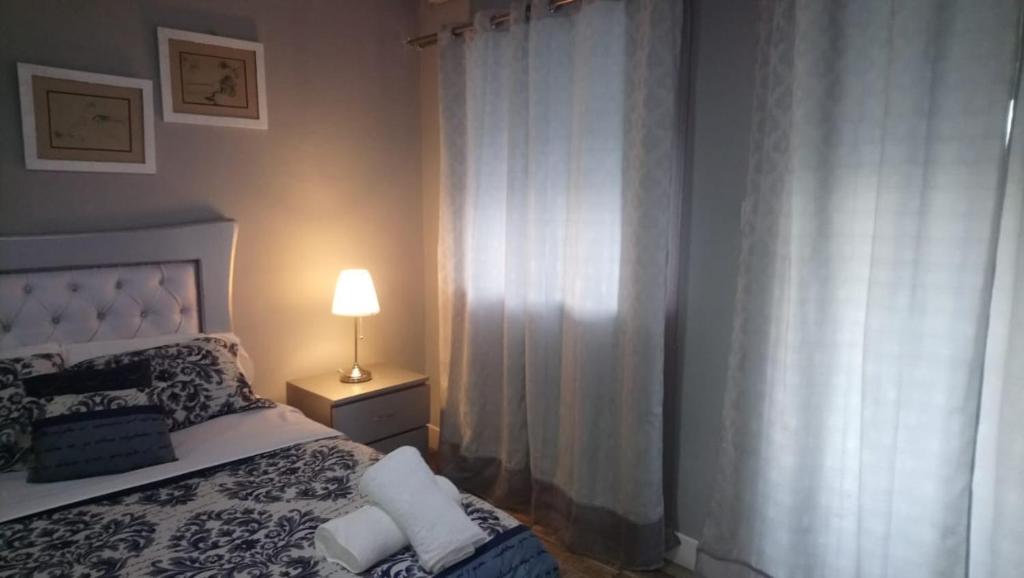Postel nebo postele na pokoji v ubytování Tavalero Rooms