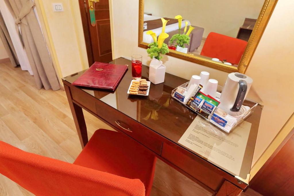 Příslušenství pro přípravu čaje a kávy v ubytování Hotel Camelia