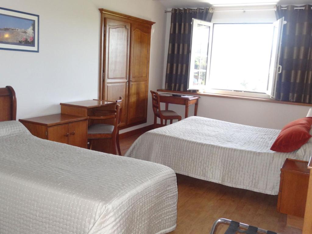 Postel nebo postele na pokoji v ubytování Hotel Eskualduna Chez Katina