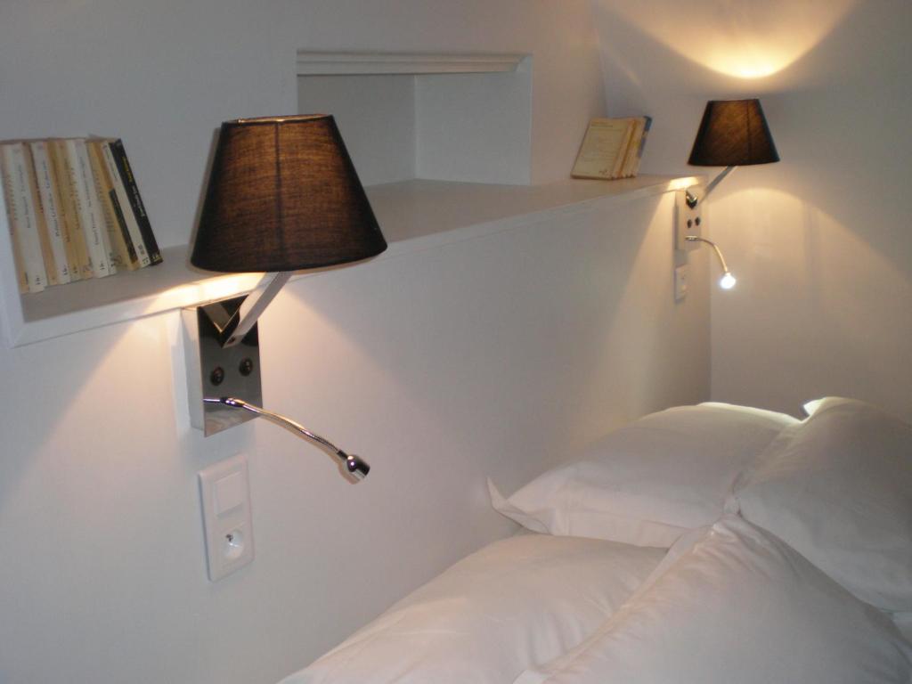 Postel nebo postele na pokoji v ubytování Best Western Hôtel Montgomery