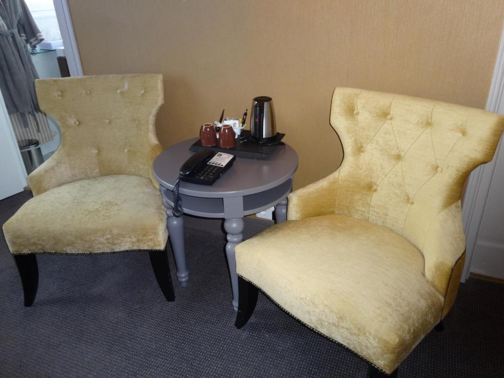 Posezení v ubytování Best Western Hôtel Montgomery