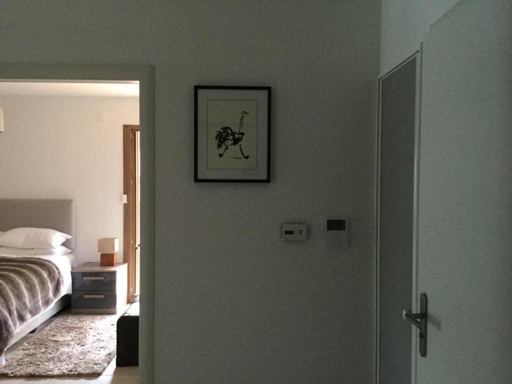 Postel nebo postele na pokoji v ubytování Les 4 Elements