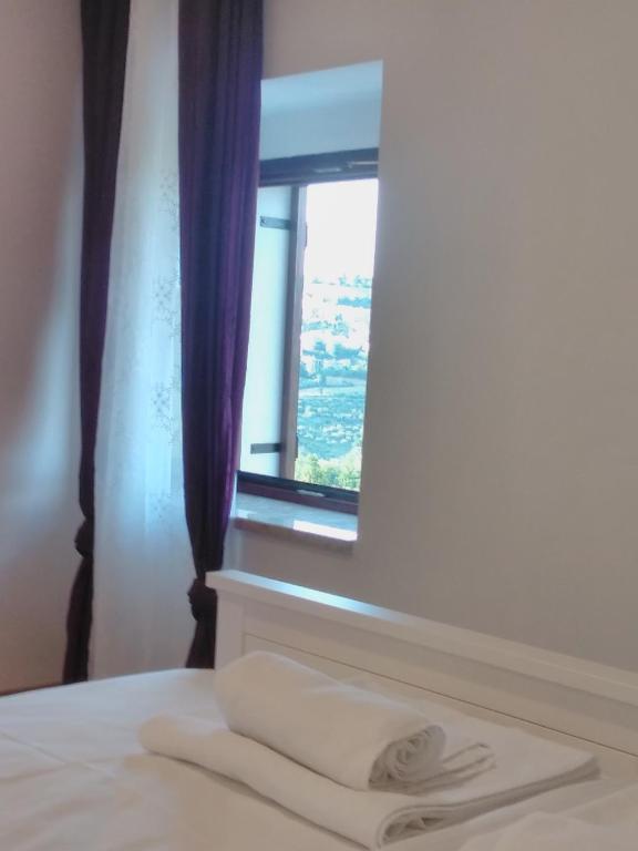 Postel nebo postele na pokoji v ubytování Casa Rossa Motovun