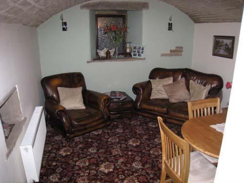 Posezení v ubytování Rosebud Cottage Guest House