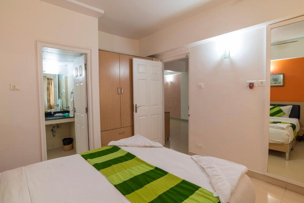 Postel nebo postele na pokoji v ubytování IMA House