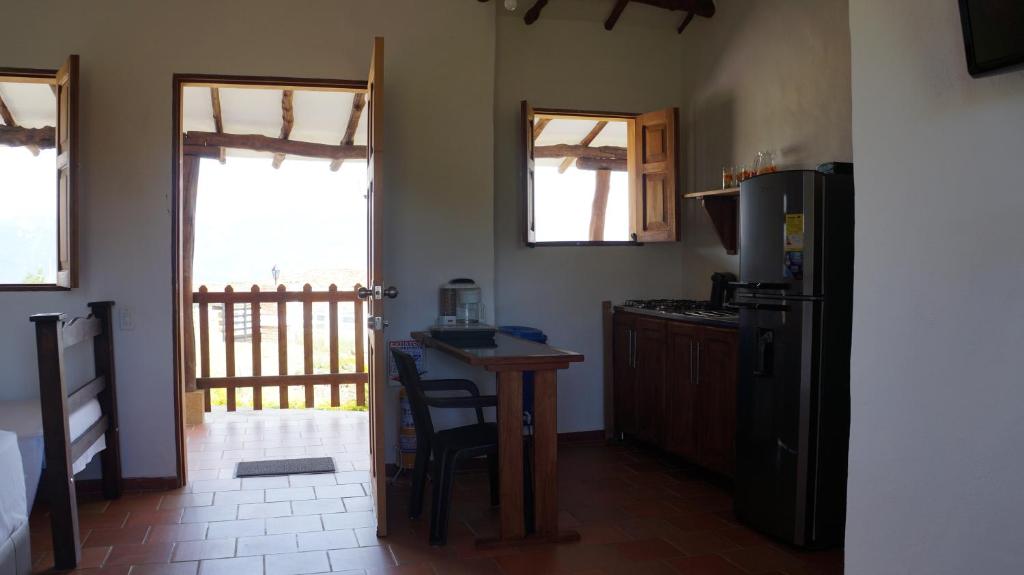 Kuchyň nebo kuchyňský kout v ubytování Timbarra Cottage