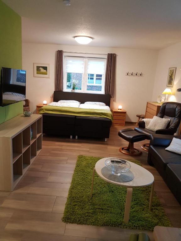 Postel nebo postele na pokoji v ubytování Landhaus Westerloy