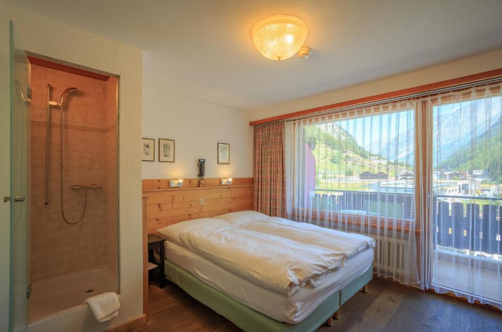 Postel nebo postele na pokoji v ubytování Arca Aparthotel & Spa