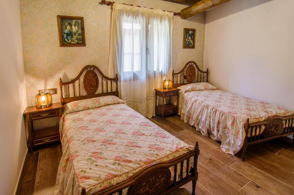 Postel nebo postele na pokoji v ubytování Borda Fuertes