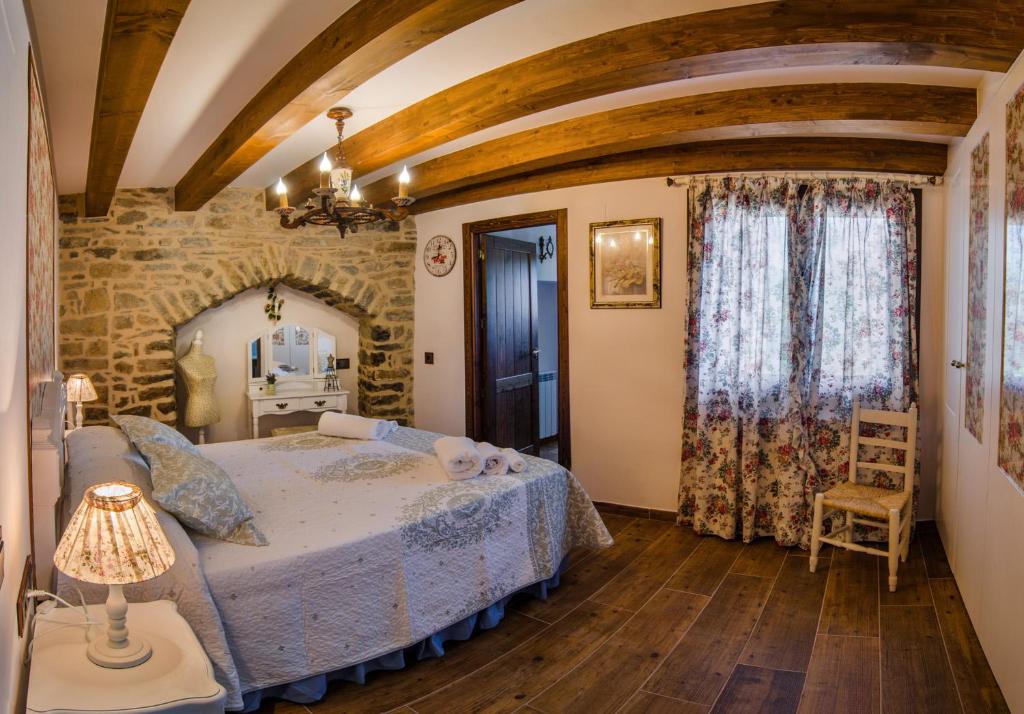 Postel nebo postele na pokoji v ubytování Borda Fuertes