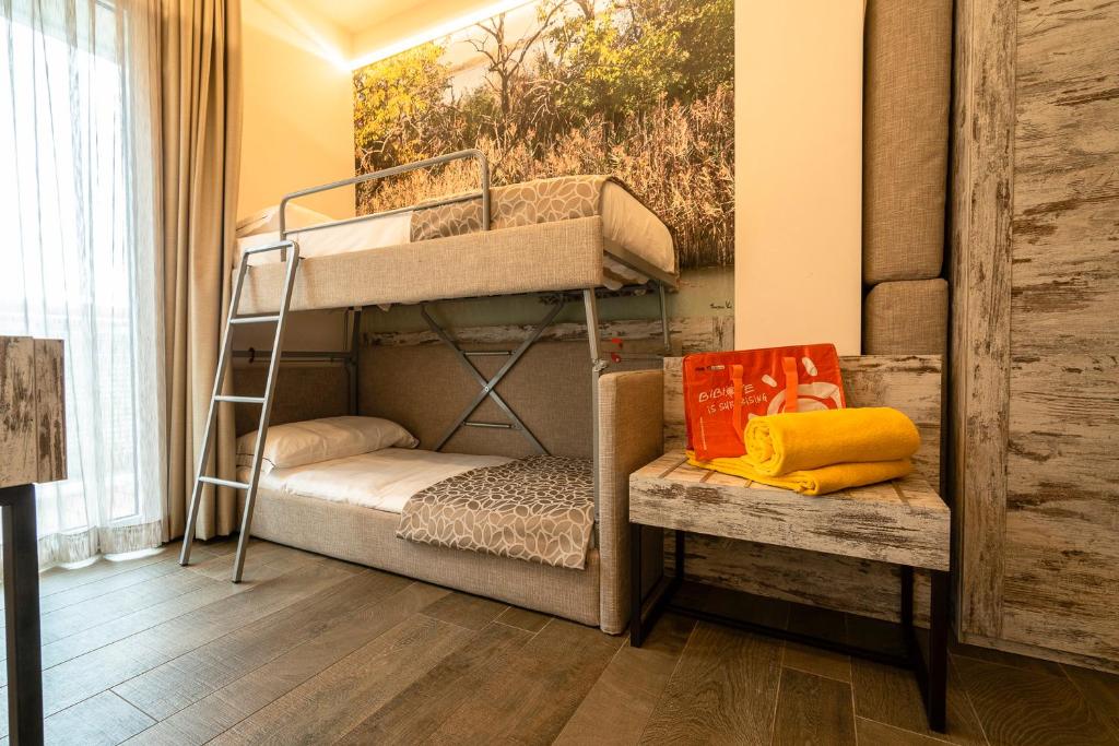 Postel nebo postele na pokoji v ubytování Hotel Ambassador