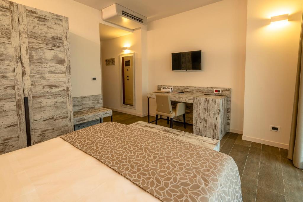 TV a/nebo společenská místnost v ubytování Hotel Ambassador