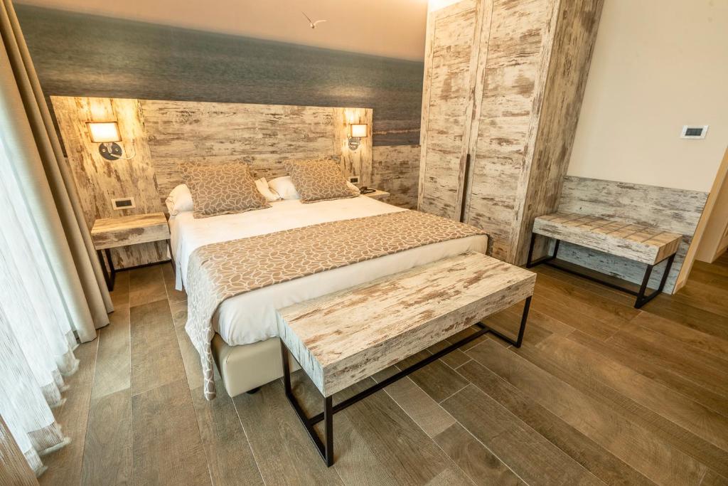 Postel nebo postele na pokoji v ubytování Hotel Ambassador