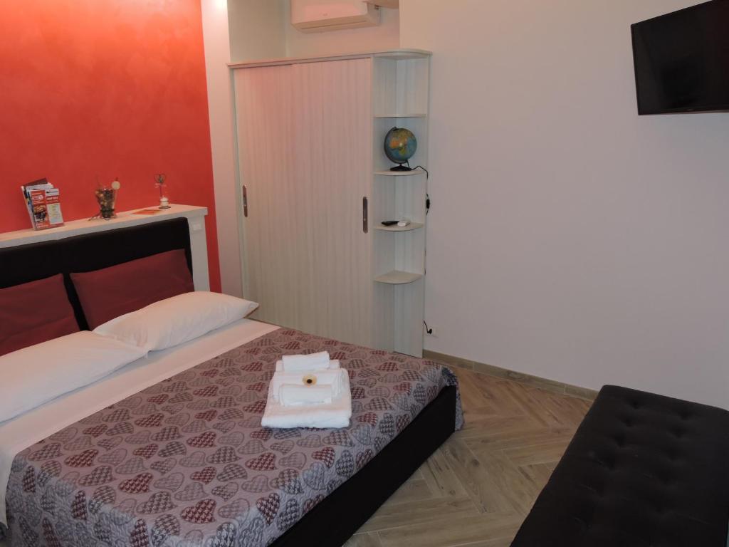 A bed or beds in a room at MarEtna