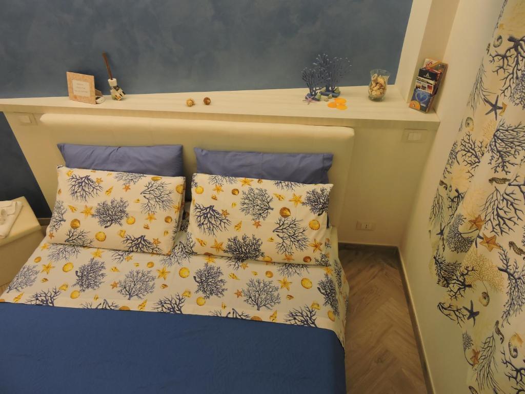 A bed or beds in a room at MarEtna