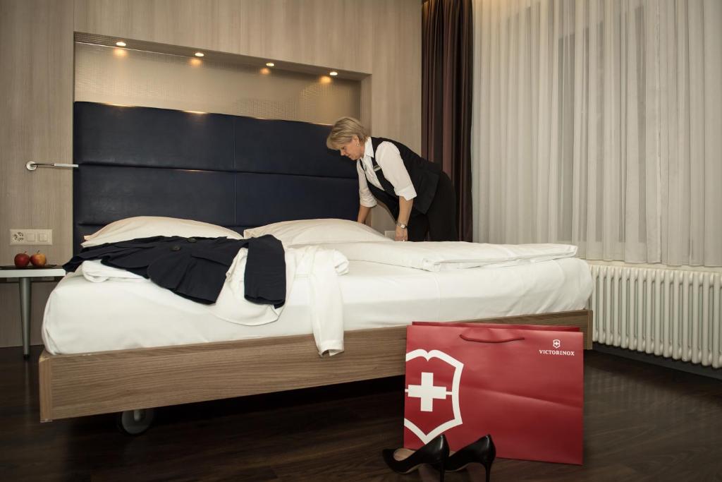 Postel nebo postele na pokoji v ubytování Hotel Alexander Zurich Old Town
