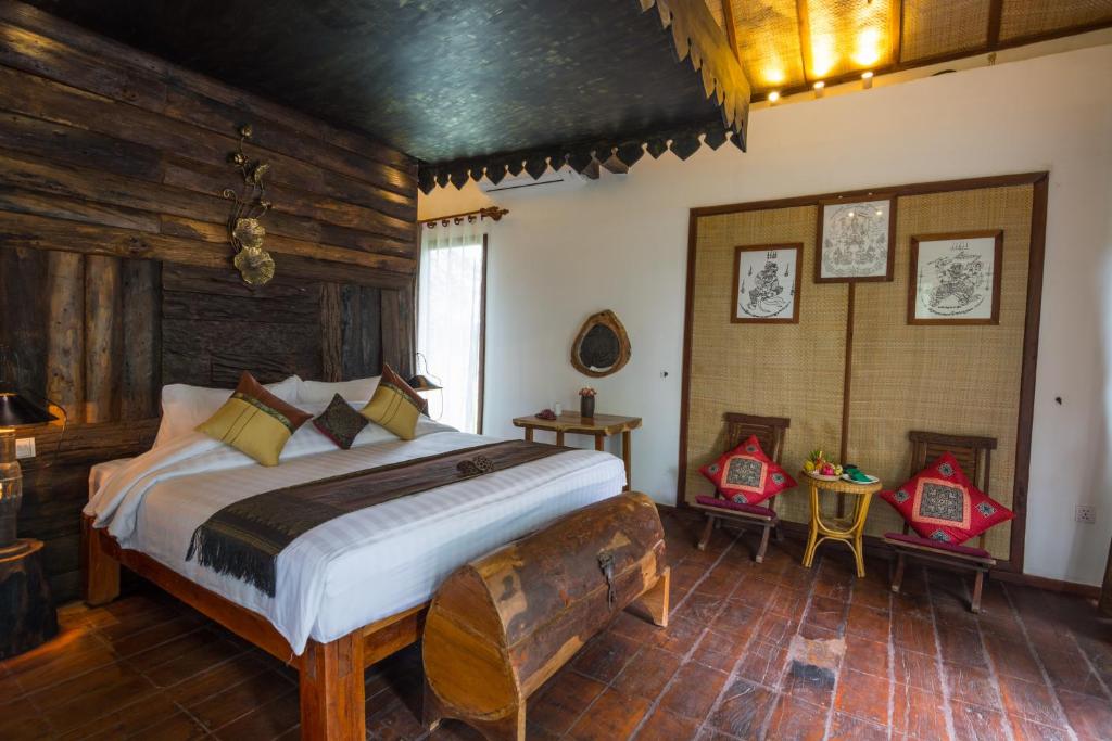Postel nebo postele na pokoji v ubytování Bong Thom Forest Lodge