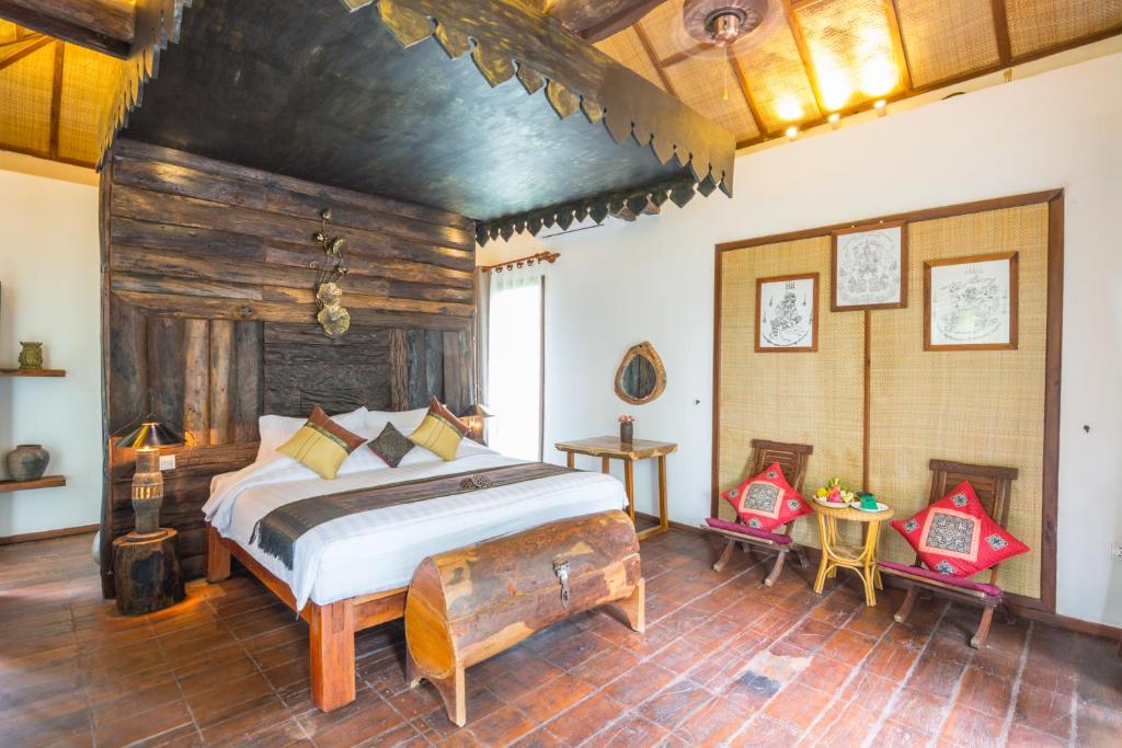 Postel nebo postele na pokoji v ubytování Bong Thom Forest Lodge