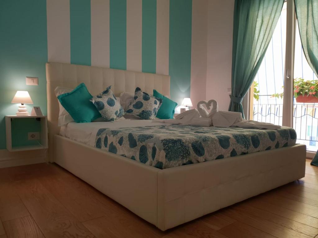 Postel nebo postele na pokoji v ubytování B&B La Rada