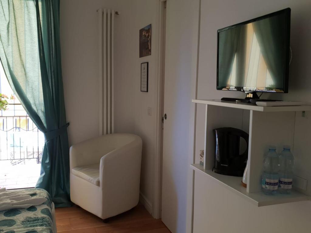 TV a/nebo společenská místnost v ubytování B&B La Rada