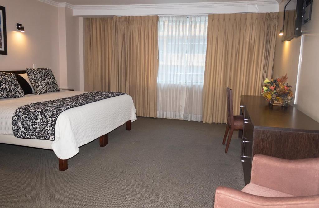 Postel nebo postele na pokoji v ubytování Hotel Novalux