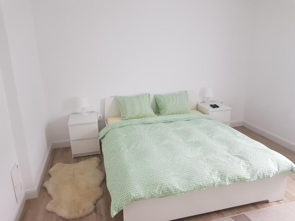 Postel nebo postele na pokoji v ubytování Luxury Apartment