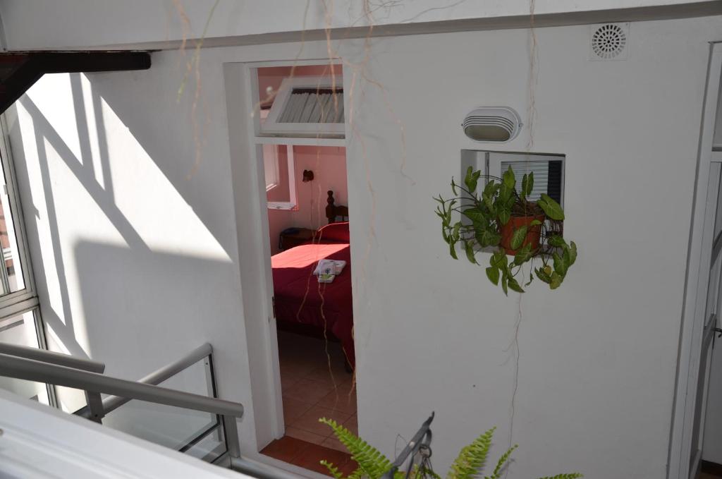 Un ou plusieurs lits dans un hébergement de l'établissement Hotel Romi