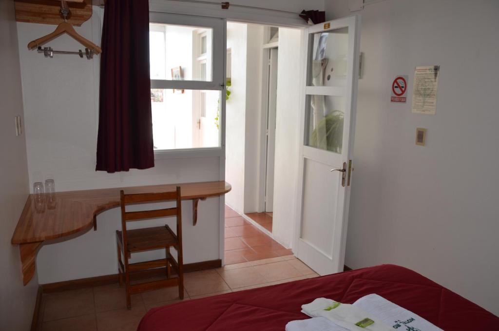 Un ou plusieurs lits dans un hébergement de l'établissement Hotel Romi