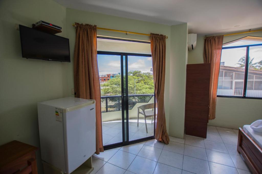 TV a/nebo společenská místnost v ubytování Hostal Andry