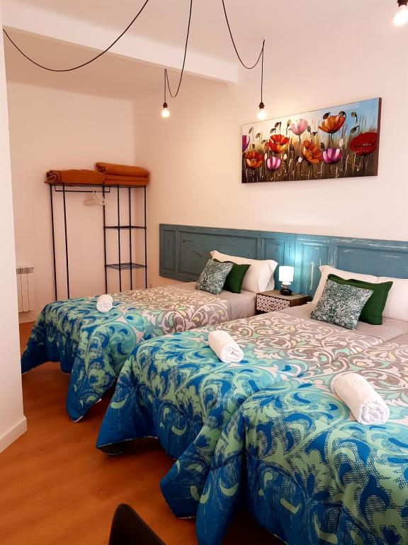 Cama o camas de una habitación en Pensión Sotelo