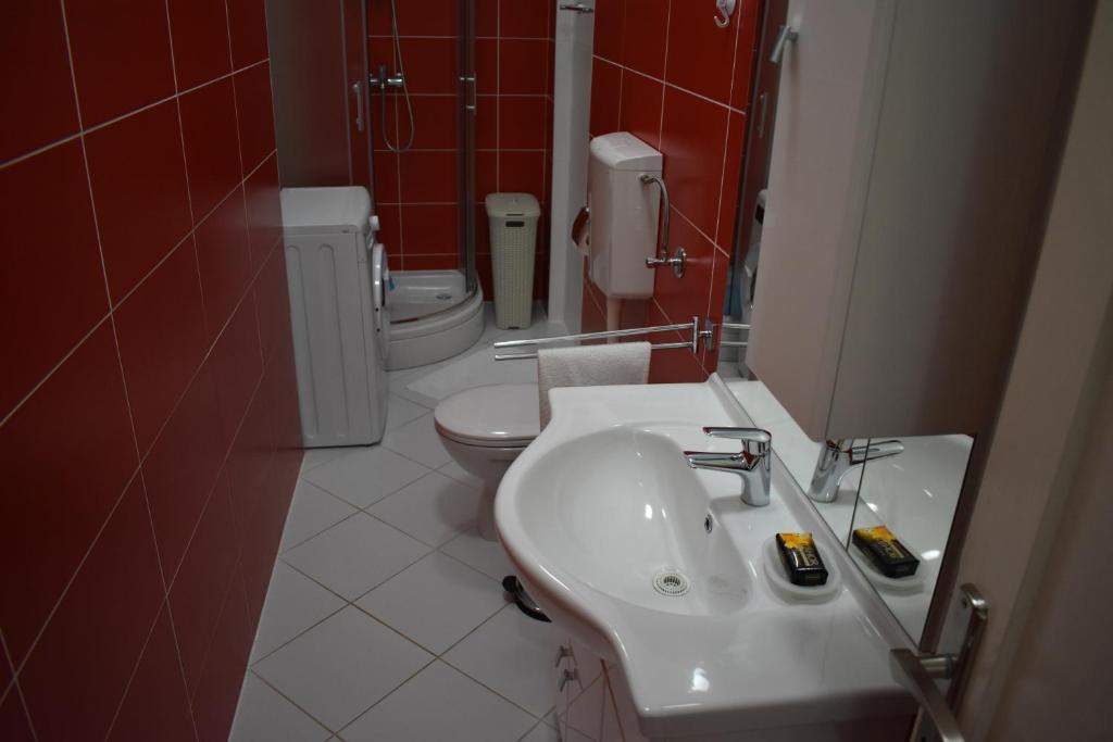 Kúpeľňa v ubytovaní Apartments Svilan