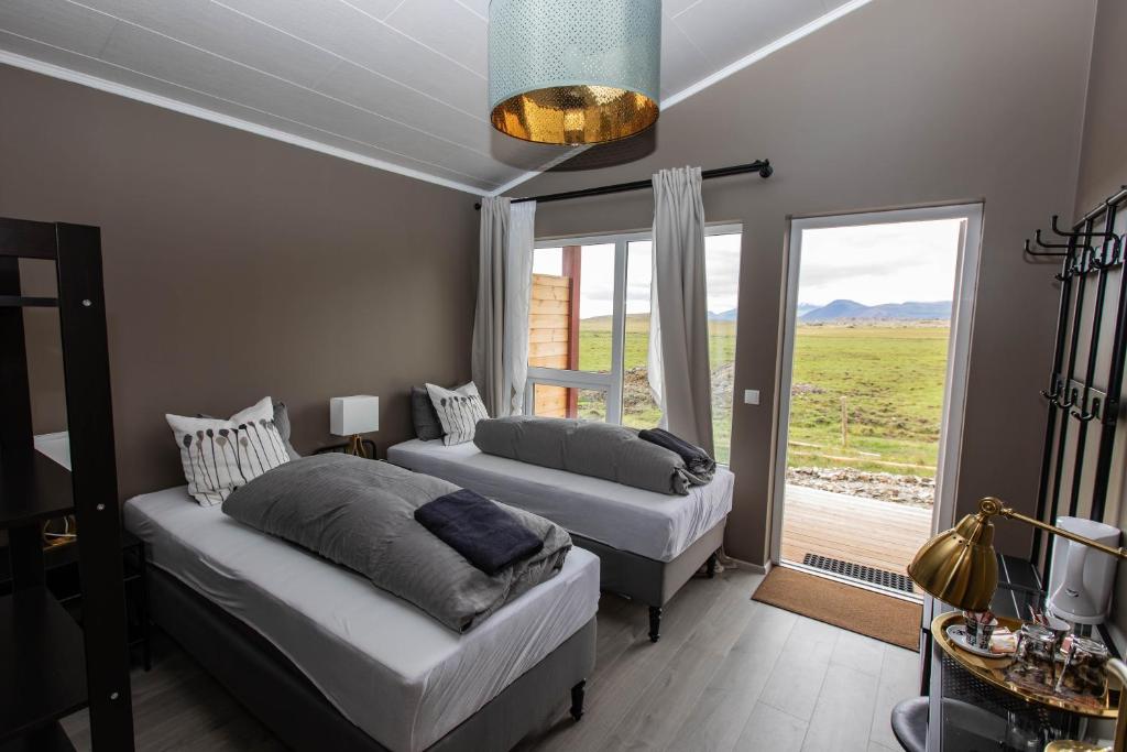 Rúm í herbergi á Lysuholl