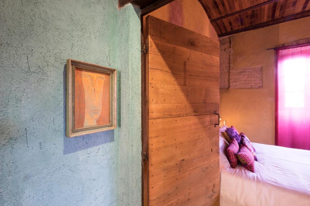 Postel nebo postele na pokoji v ubytování Palazzo d'Assi - Guest house