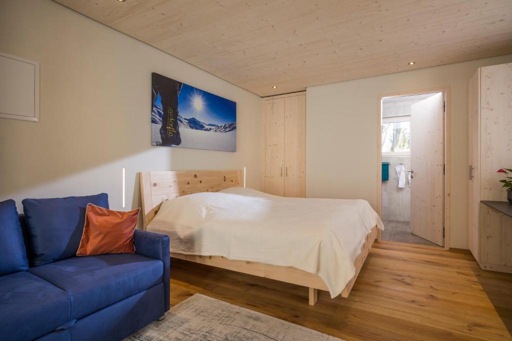 Ένα ή περισσότερα κρεβάτια σε δωμάτιο στο powderhome